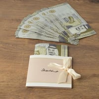 بوك للعيديات فاخر لون وردي ونمط أبيض بختم "عيدكم م...