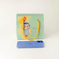 علب التوزيعات للأولاد بلون أخضر وعبارة "عيدكم مبار...