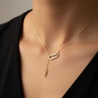 قلادة نسائية تصميم شكل مشبك مطلية ذهب عيار 18 قيرا...