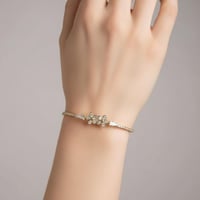 اسورة نسائية شكل وردة مطلية ذهب عيار 18 قيراط مودي...