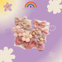 ربطات شعر بتصميم زهرة قوس لطيف