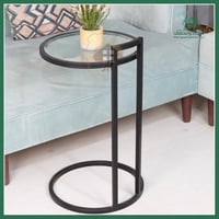 طاولة خدمة بسيطة سطح زجاج شفاف قاعدة حديد لون أسود