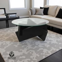 طاولة قهوة بسطح زجاج دائري