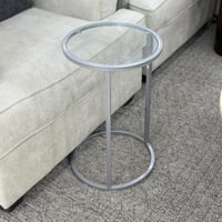 طاولة خدمة دائرية بسطح زجاجي – تصميم معدني أنيق وع...