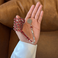 سبحة بكلايت شفافة خيط احمر