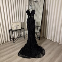 فستان ماجدولينا الأسود