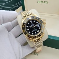 ساعة رولكس ذهبي