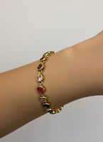 إسوارة ذهبيه بفصوص متعددة الألوان