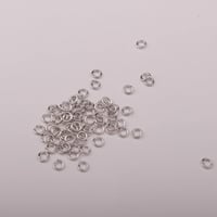 حلقات فضيه - 1.5 ملم -الكثير + 100 حبه