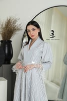 فستان فضي بتطريز كامل