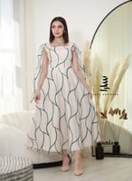 فستان بيج بتطريز اخضر