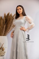 فستان فضي بتطريز كامل