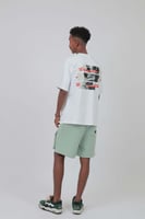 تيشرت اوفر سايز ابيض S-157 بطبعة “الفتاة السمراء”