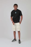 تيشيرت اوفر سايز أسود بطبعة “BE KIND”