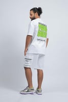 تيشرت اوفر سايز ابيض عباره خضراء