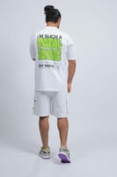 تيشرت اوفر سايز ابيض عباره خضراء