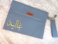 شنط ايباد مميزة مع مسكة يد مع كتابة الاسم