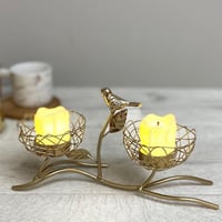 شمعدان غصن الشجرة