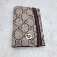 محفظة قوتشي