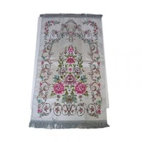 سجادة صلاة بتصميم ورود