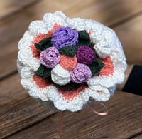 بوكيه ورد على شكل دمية