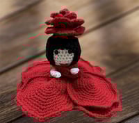 وردة بشكل دمية