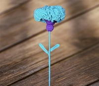 وردة على شكل دمية