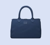 حقيبة يد من \ BANDE A BART \ تتميز بتصميمها العصري...