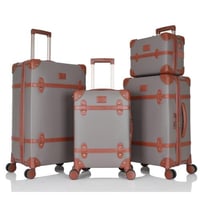 طقم حقائب سفر كلاسيكية من 4 قطع – مغطاة بجلد فاخر...