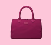 حقيبة يد من \ BANDE A BART \ تتميز بتصميمها العصري...