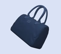 حقيبة يد من \ BANDE A BART \ تتميز بتصميمها العصري...