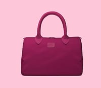 حقيبة يد من \ BANDE A BART \ تتميز بتصميمها العصري...