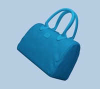 حقيبة يد من \ BANDE A BART \ تتميز بتصميمها العصري...