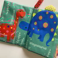 كتاب قماشي - الديناصورات