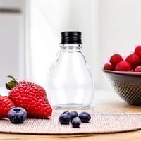 علب زجاج شكل بيضاوي بغطاء المنيوم 350مل (كرتون 72ح...