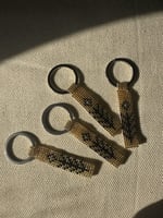 ميدالية بنقشة التولة