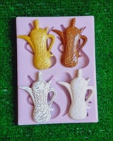 سيلكون مجسم شكل دله مع عباره عيد سعيد ٤ فتحات