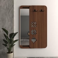 مرآة مودرن مع علاقات للملابس