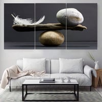 ثلاث لوحات قماشية مودرن - بتصميم ريشة و صخرة - كل...