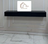 طاولة تلفزيون معلقة