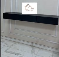 طاولة تلفزيون معلقة