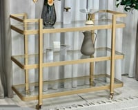 عربة تقديم ذهبي