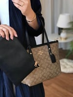 شنطة كوتش دبل فيس