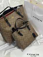 شنطة كوتش مولي حجمين