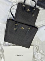 شنطة كوتش مولي حجمين