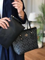 شنطة كوتش دبل فيس