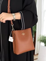 حقيبة كوتش باكيت نسائية