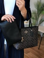 شنطة كوتش دبل فيس