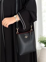 حقيبة كوتش باكيت نسائية