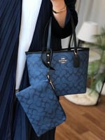 شنطة كوتش دبل فيس